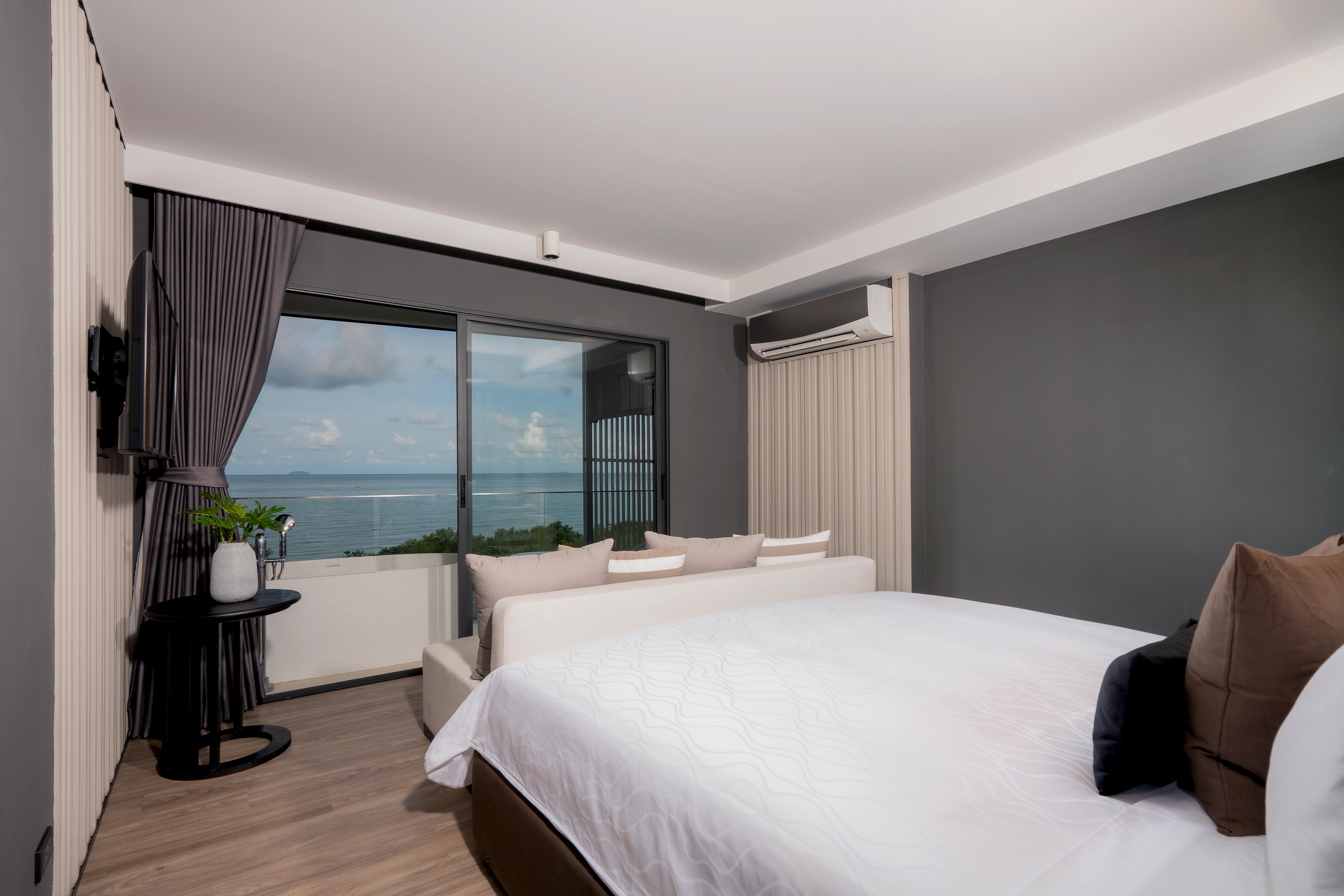 Bayphere Hotel Pattaya Jc Na Chom Thian Dış mekan fotoğraf A bedroom in a hotel